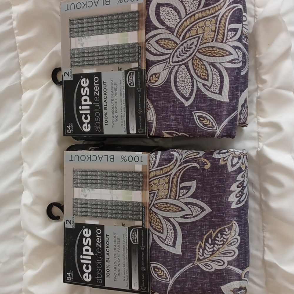2 sets of blackout curtains. 2 panels in each. Total of 4 in all.